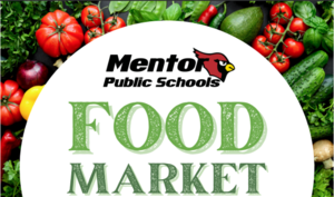 Vegetables and fruits arranged around a circular sign for a food market.