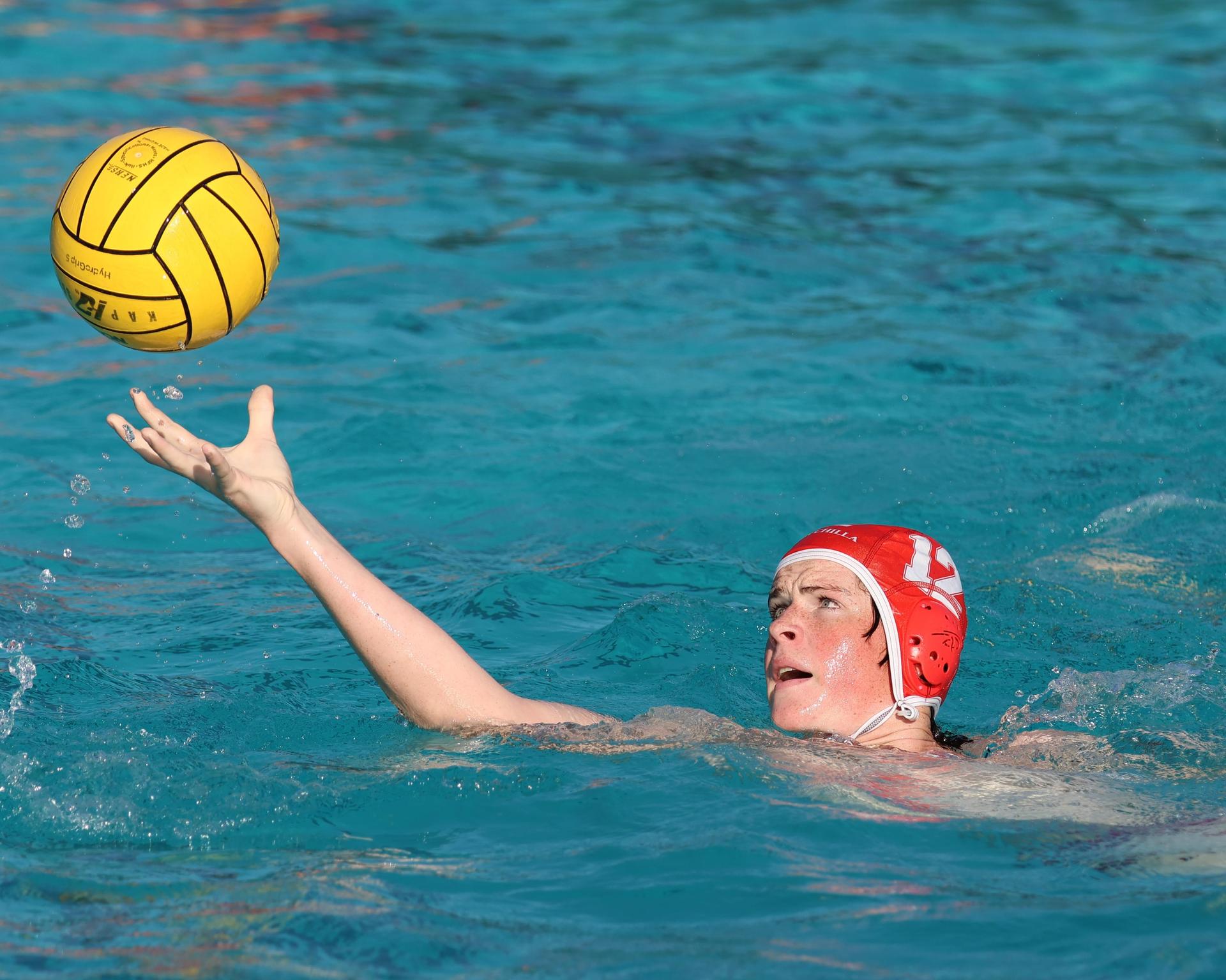 Boys playing water polo against Yosemite
