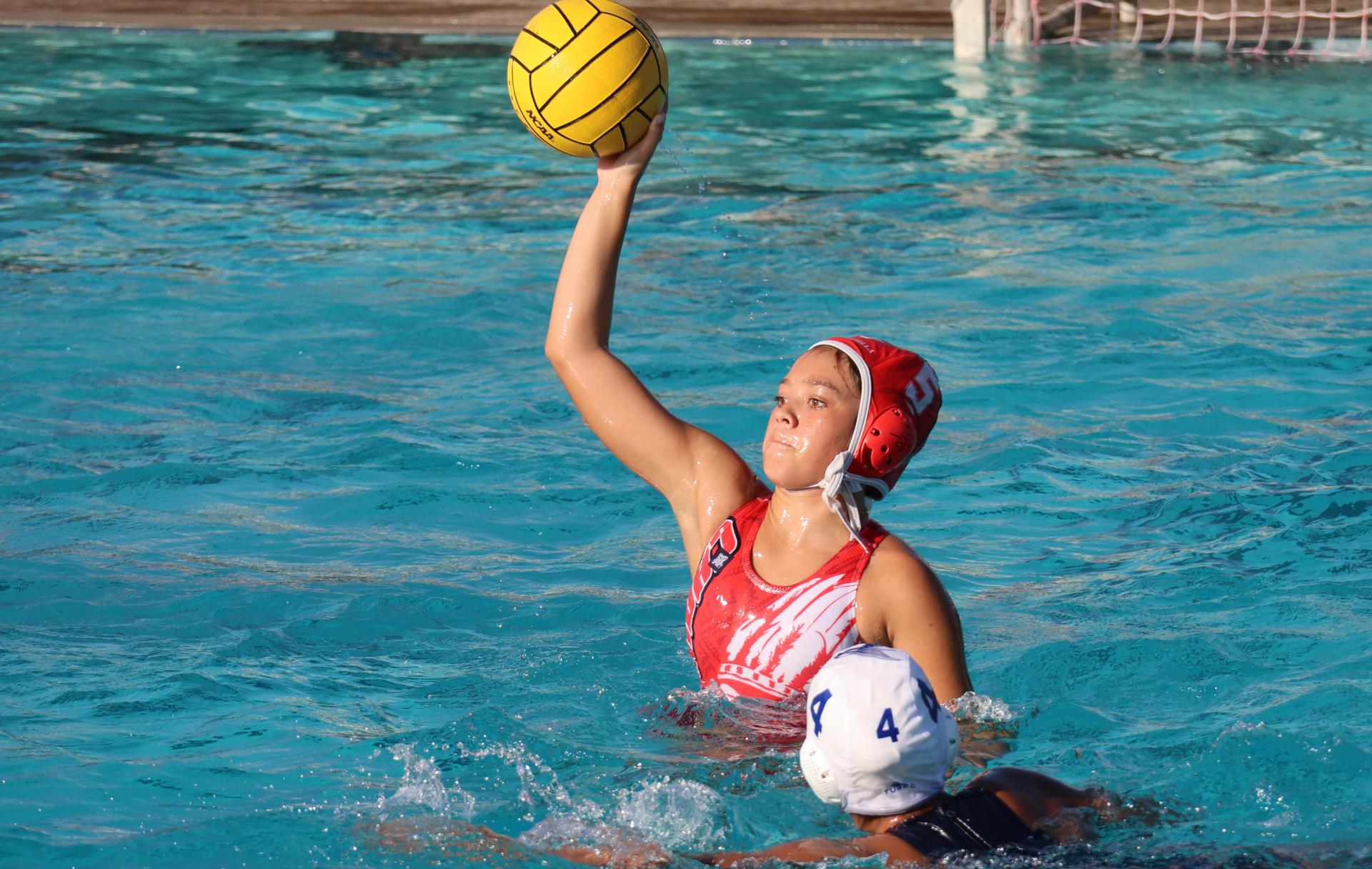 girls playing water polo against Sanger West