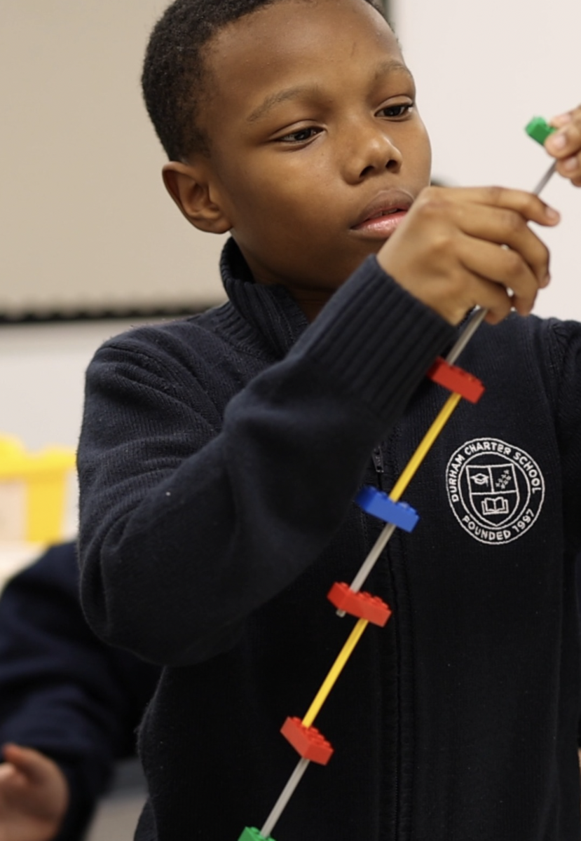scholar building lego