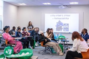 Leon Ford speaks with students