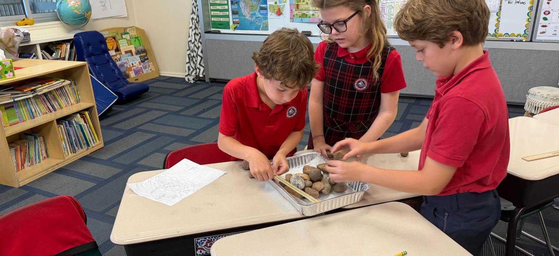 2nd grade students explore rocks in science