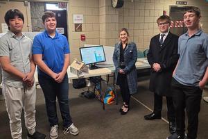 9th-graders Nicholas Phan, Nolan Yeager, Liam McCabe, and Colton Ward with Senator Kim Ward (center)