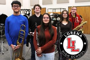 Lorena High School band stduents standing in a group holding instruments in the band hall