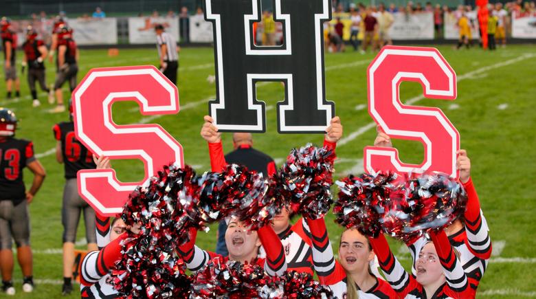Cheerleaders cheering