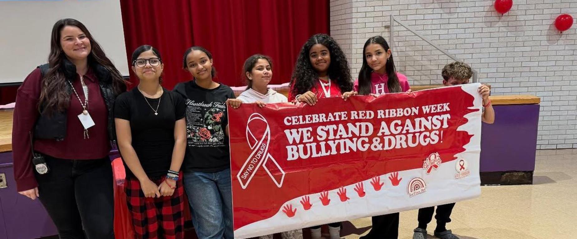 students holding banner