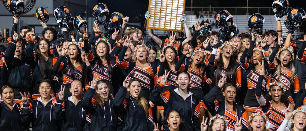 students celebrating football win for Homecoming
