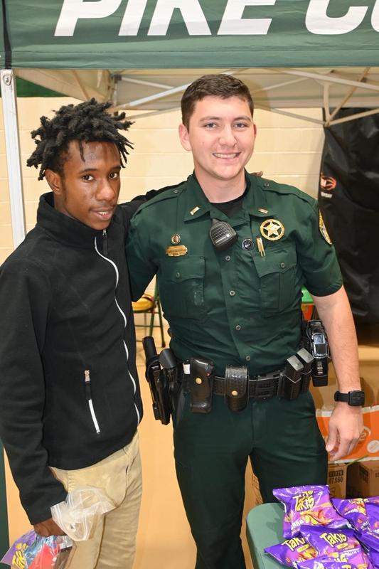 Pike County Sheriff’s Office Deputies Greet Superintendent Dr. Geneva Holmes at Eagles Carnival 2025