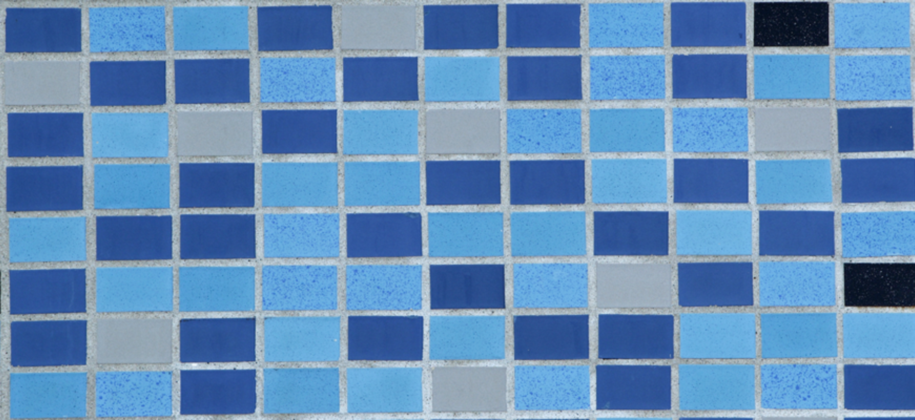 Photo of Mid-century mosaic tile pattern found on school exterior.