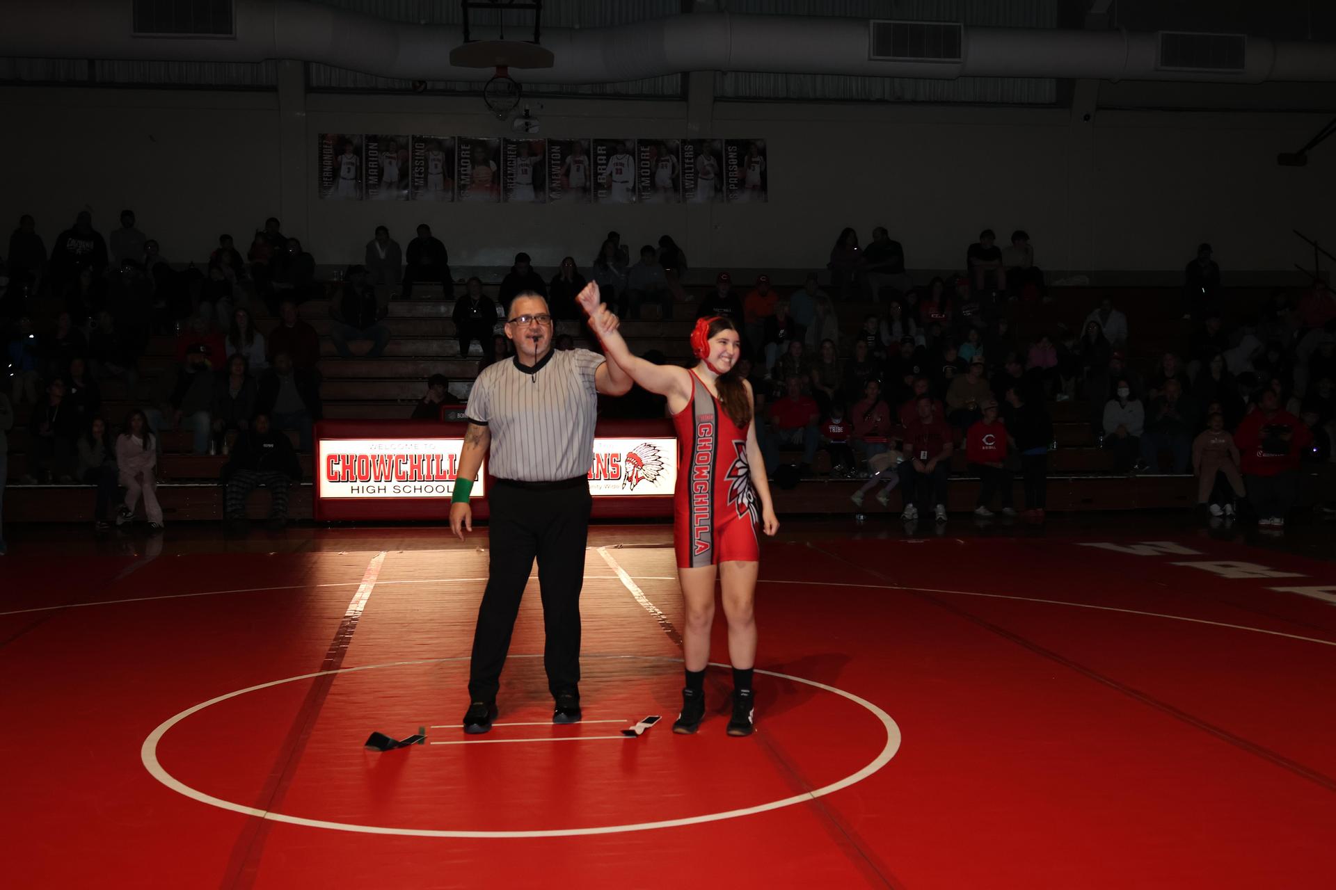 Wrestling winners with hands up 11