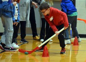 a boy playing hockey