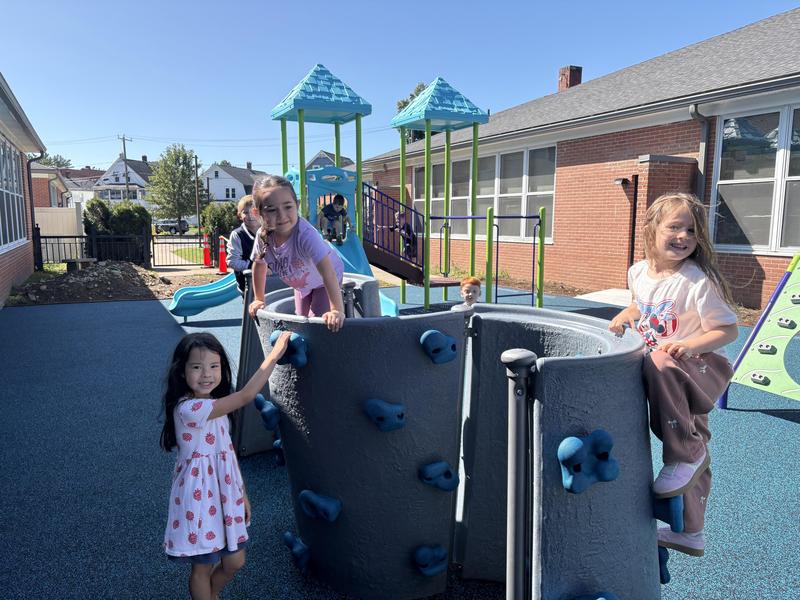 students playing on new school playground