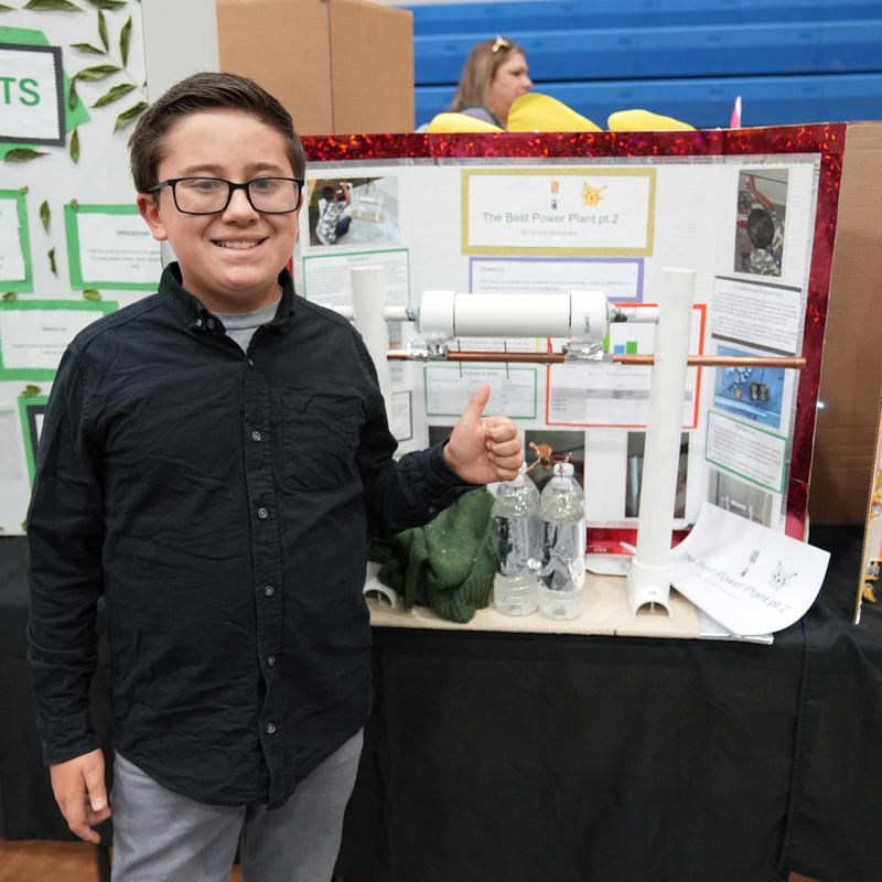 student with science fair project