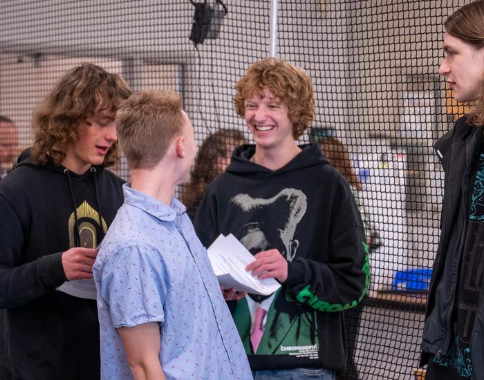 students celebrating award