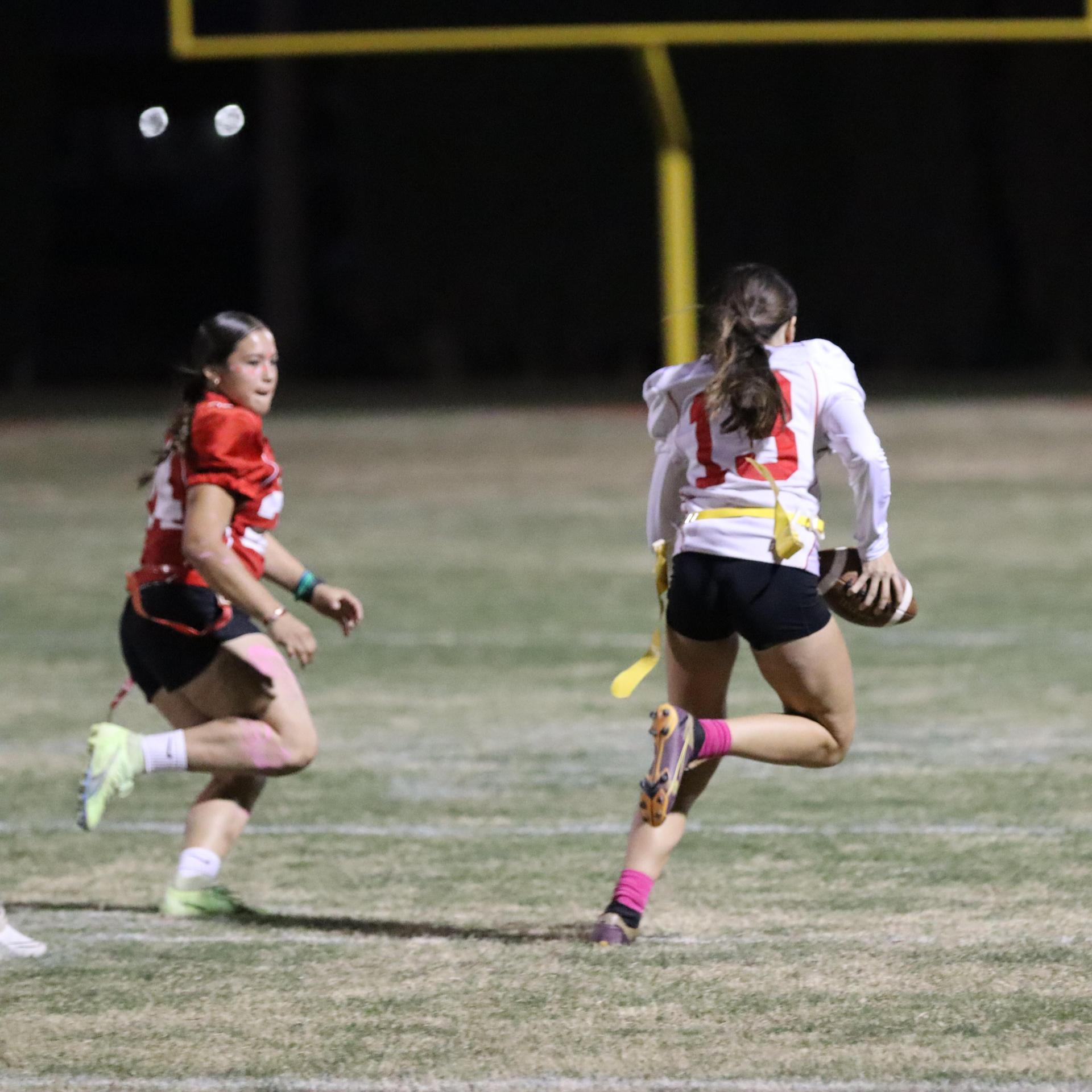 girls playing flag football