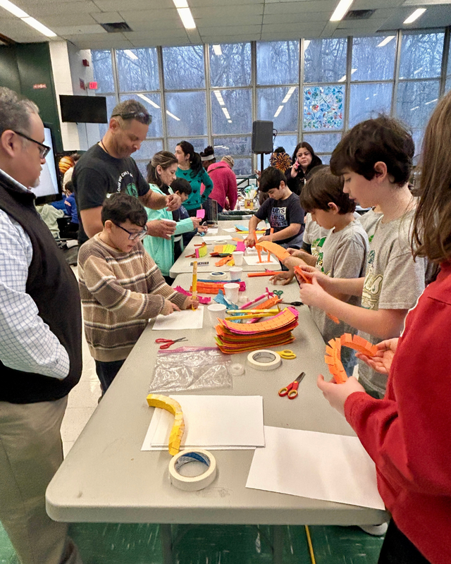 Students at station to build roller coasters