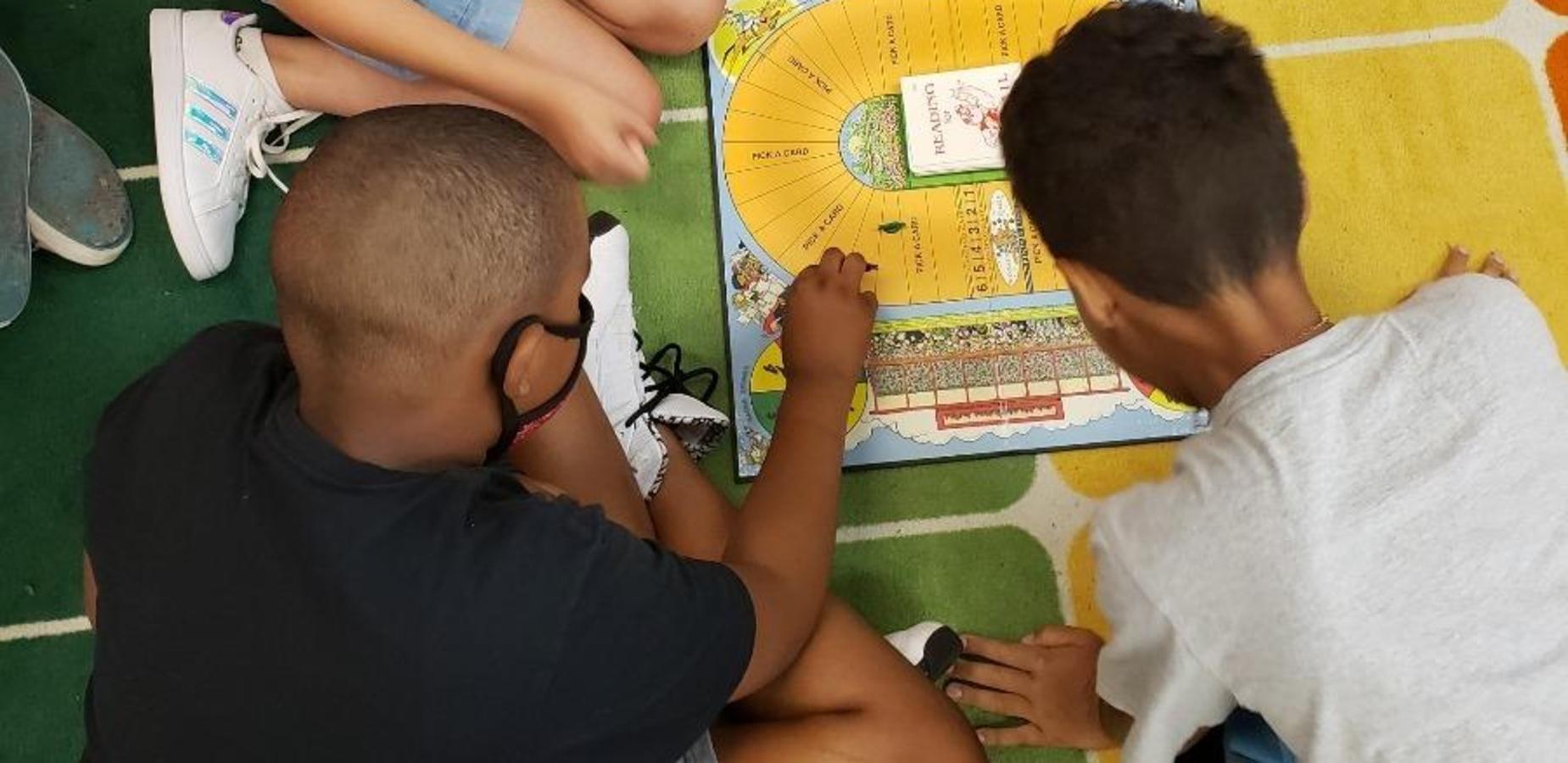 Kids playing a board game