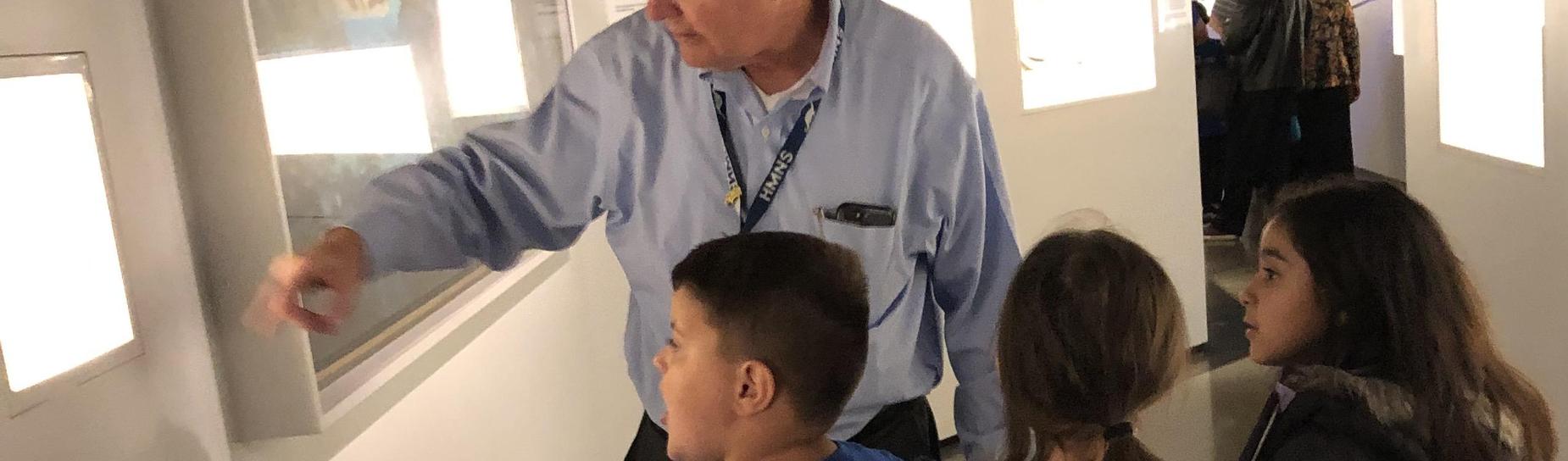 The guide is sparking curiosity for these young scientists.