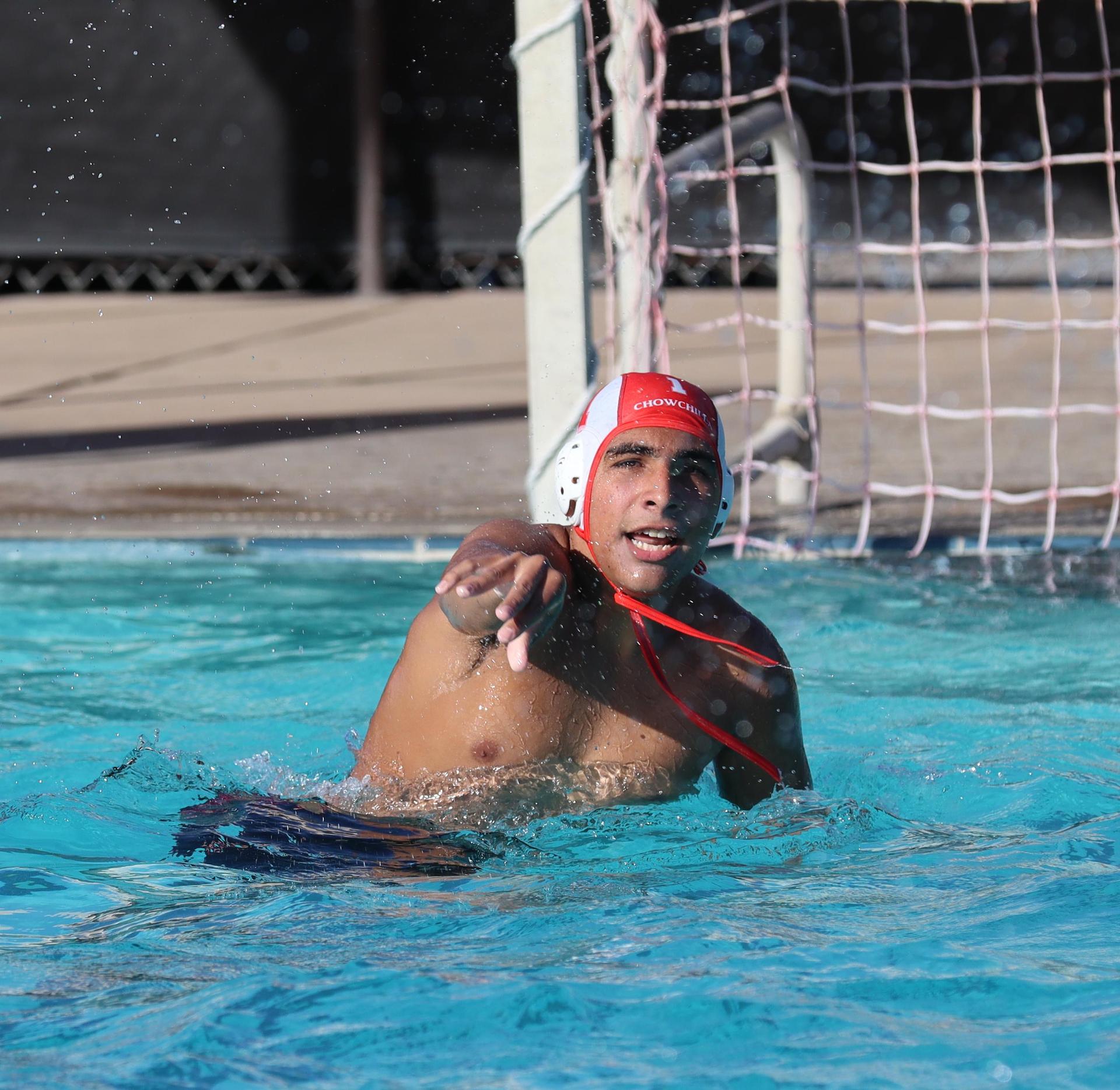 boys water polo players in action against san joaquin memorial