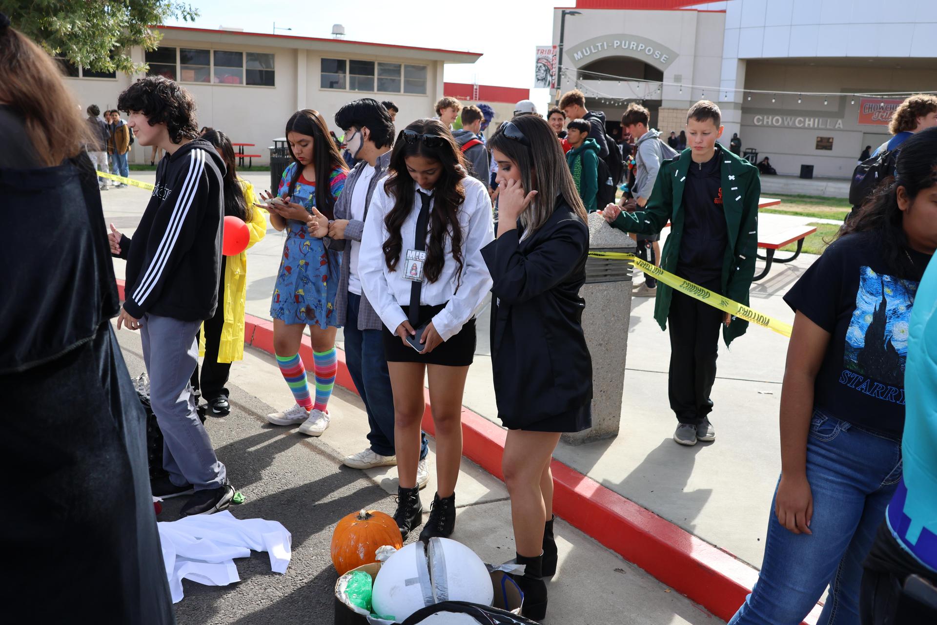 students and staff enjoying the pumpkin drop
