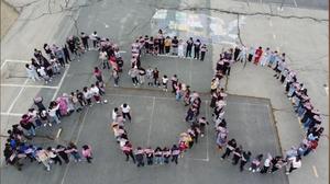 Ashfield students form a human "250" as part of their video submission