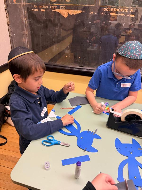 Students working on their paper puppets.