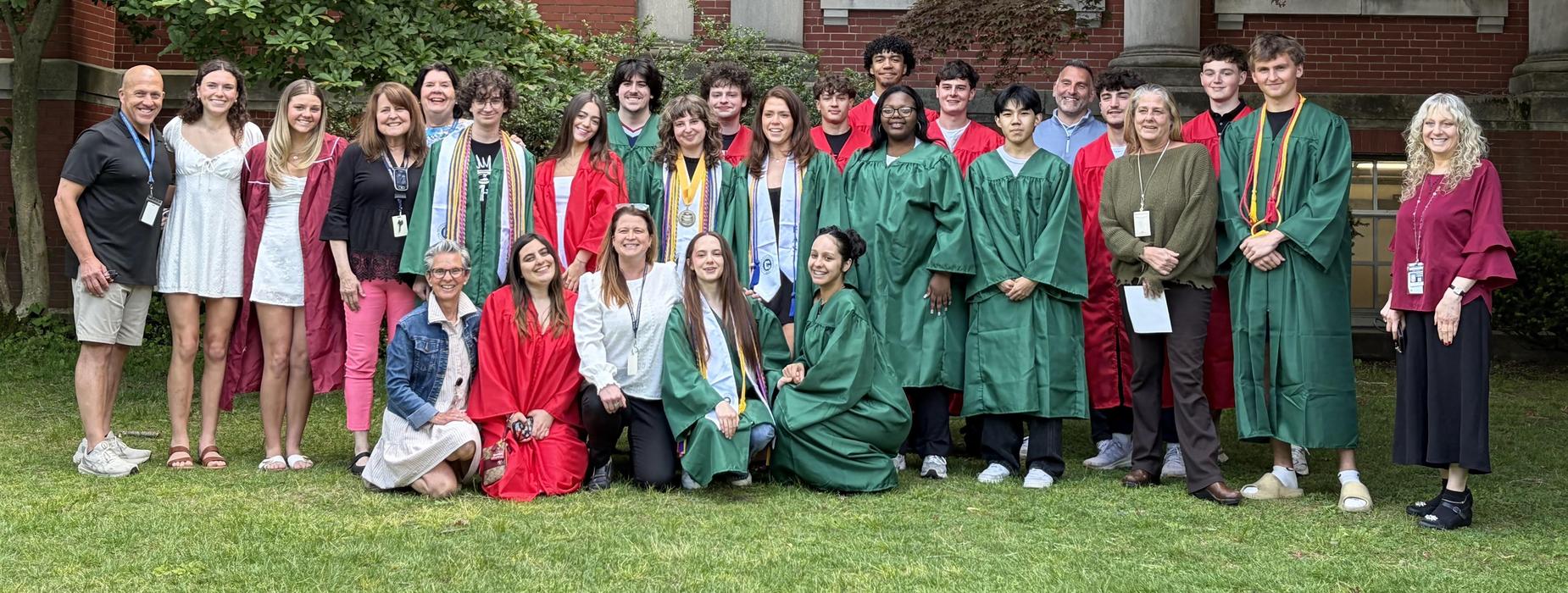CHSE and CHSW seniors pose with their Rhodes Elementary School teachers during the Senior Walks.