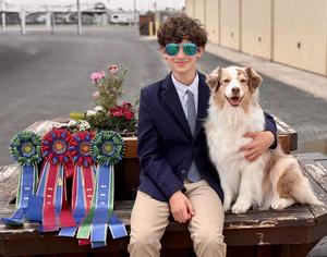 Sawyer Johnson with dog and ribbons