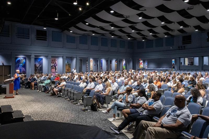 Woodland Hills faculty and staff gather in the auditorium