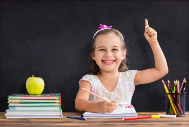 girl pointing to the ceiling