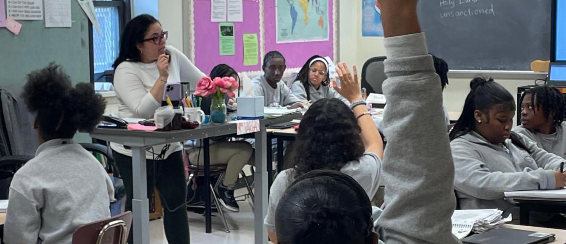 Mrs. Sola-Vargas teaching her history class