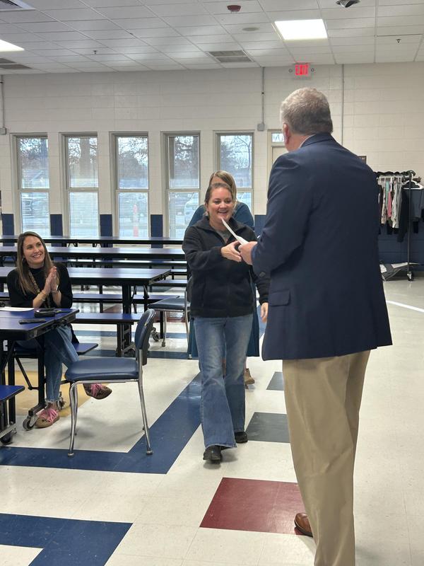 Rice Teachers Receive Checks from State Department