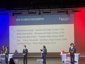 Juliana Barrientoz on stage during the awards presentation