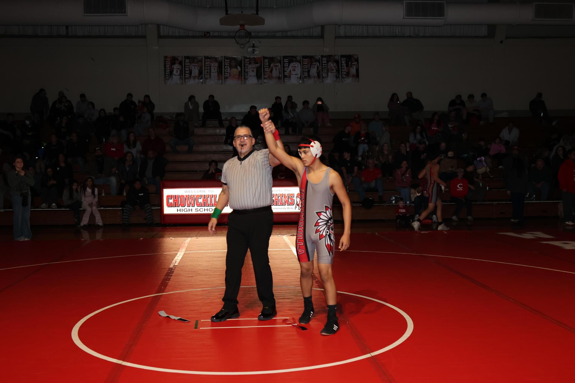 Wrestling winners with hands up 28