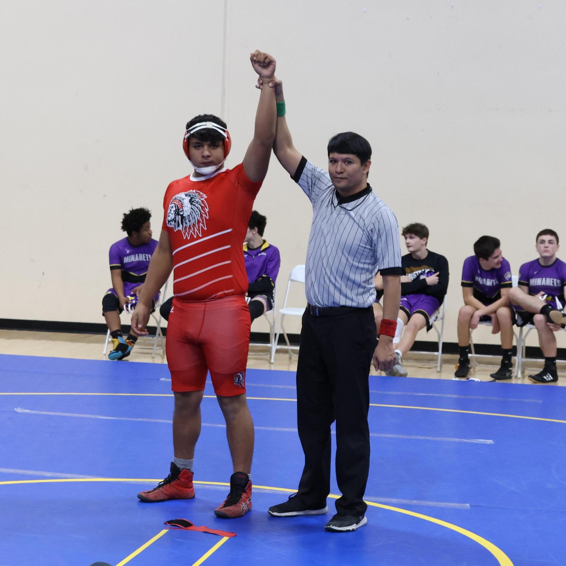 wrestlers in action at parlier
