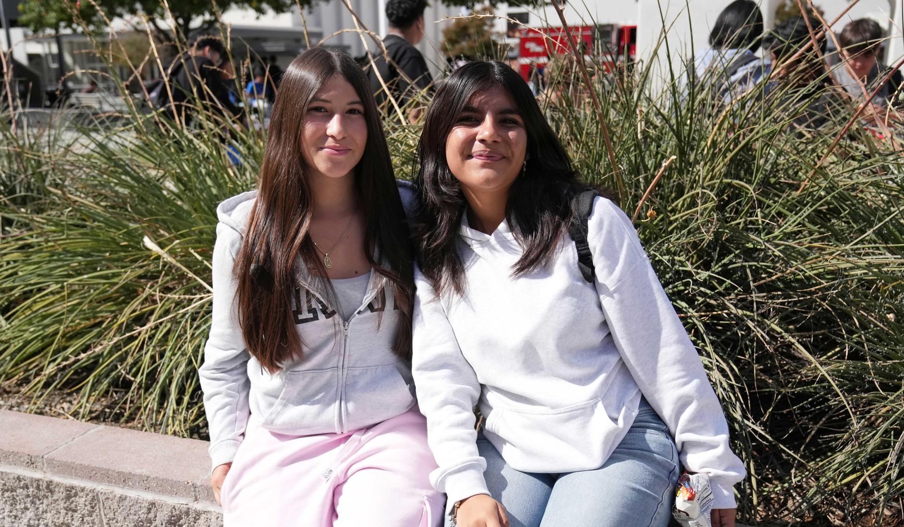 two smiling high school girls