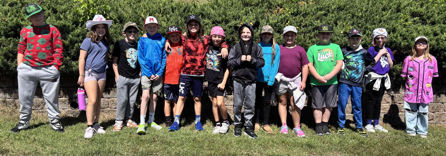 Students wear hats to school to show support for those fignting childhood cancer. Pictured are students from Mrs. Owen's 4th grade class.