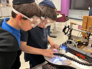 a student working on their grogger.