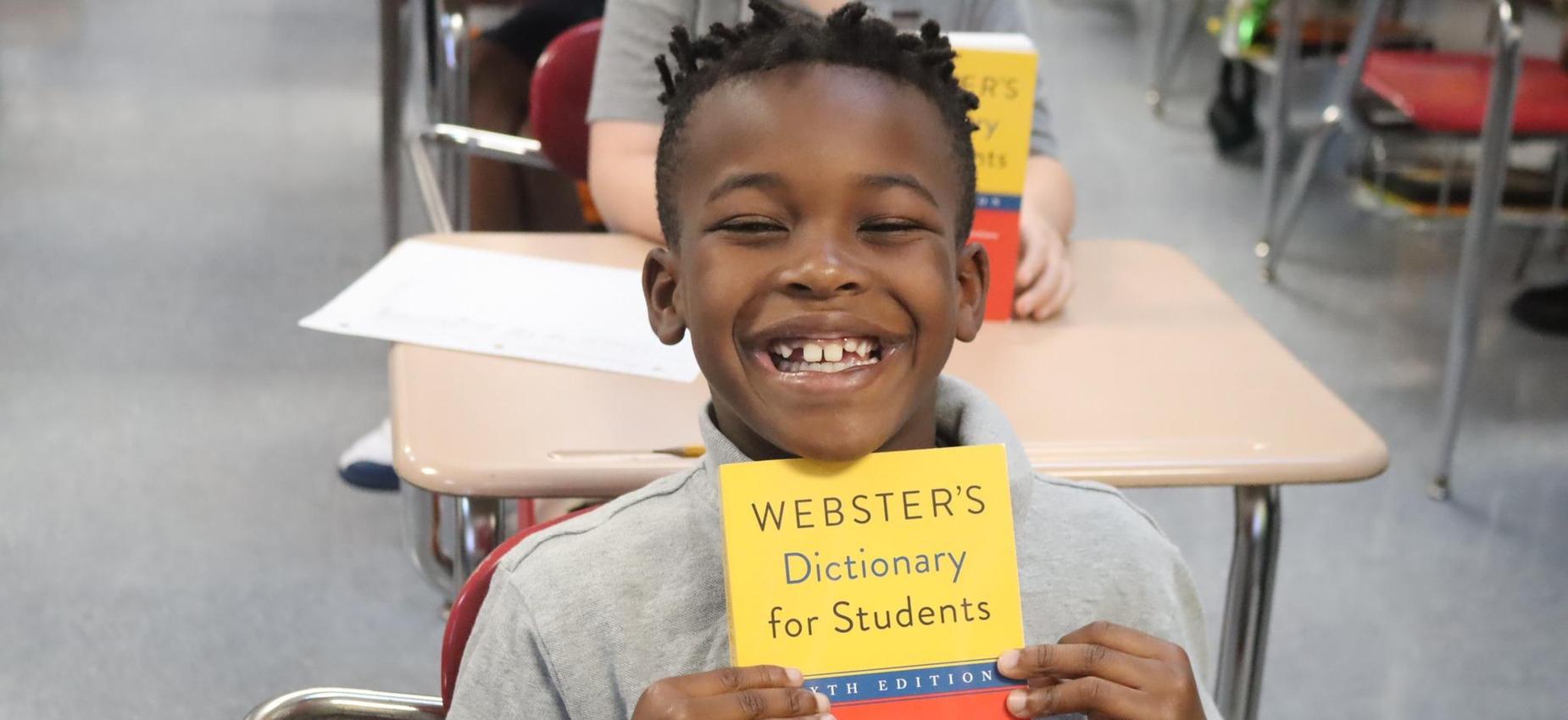 student with dictionary