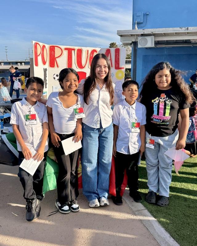 Students pose with teacher