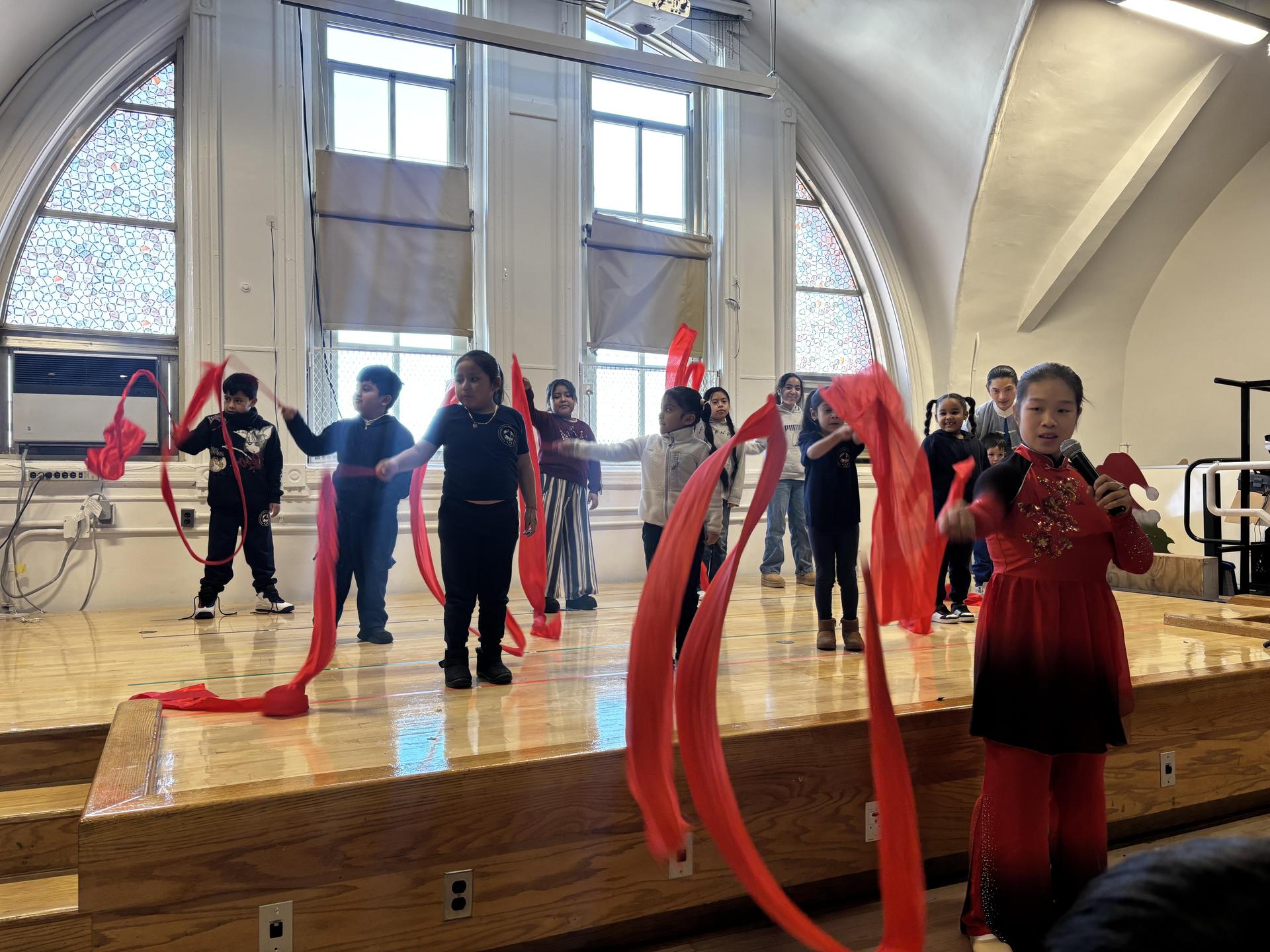 students learning a lunar new year dance.