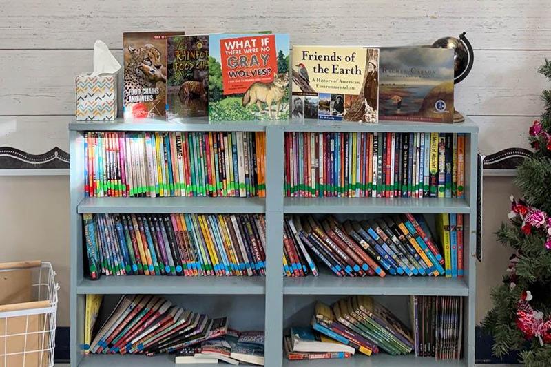 The new books now fill the bookshelves of Jasiewicz’s classroom library