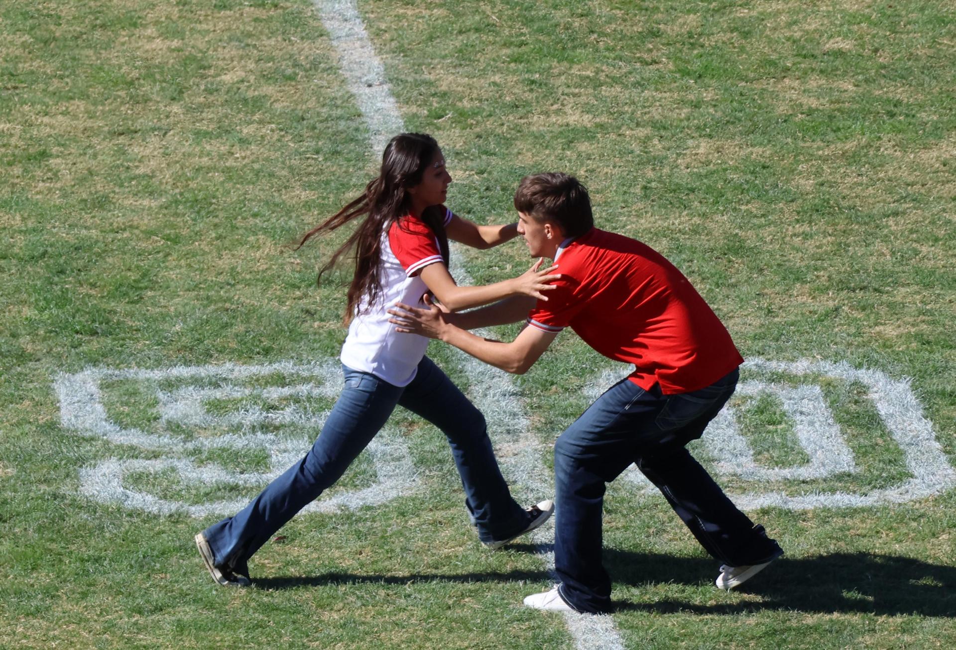 students and staff at the homecoming rally