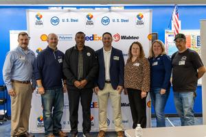 Visitors from the Steelers and US Steel pose for a photo