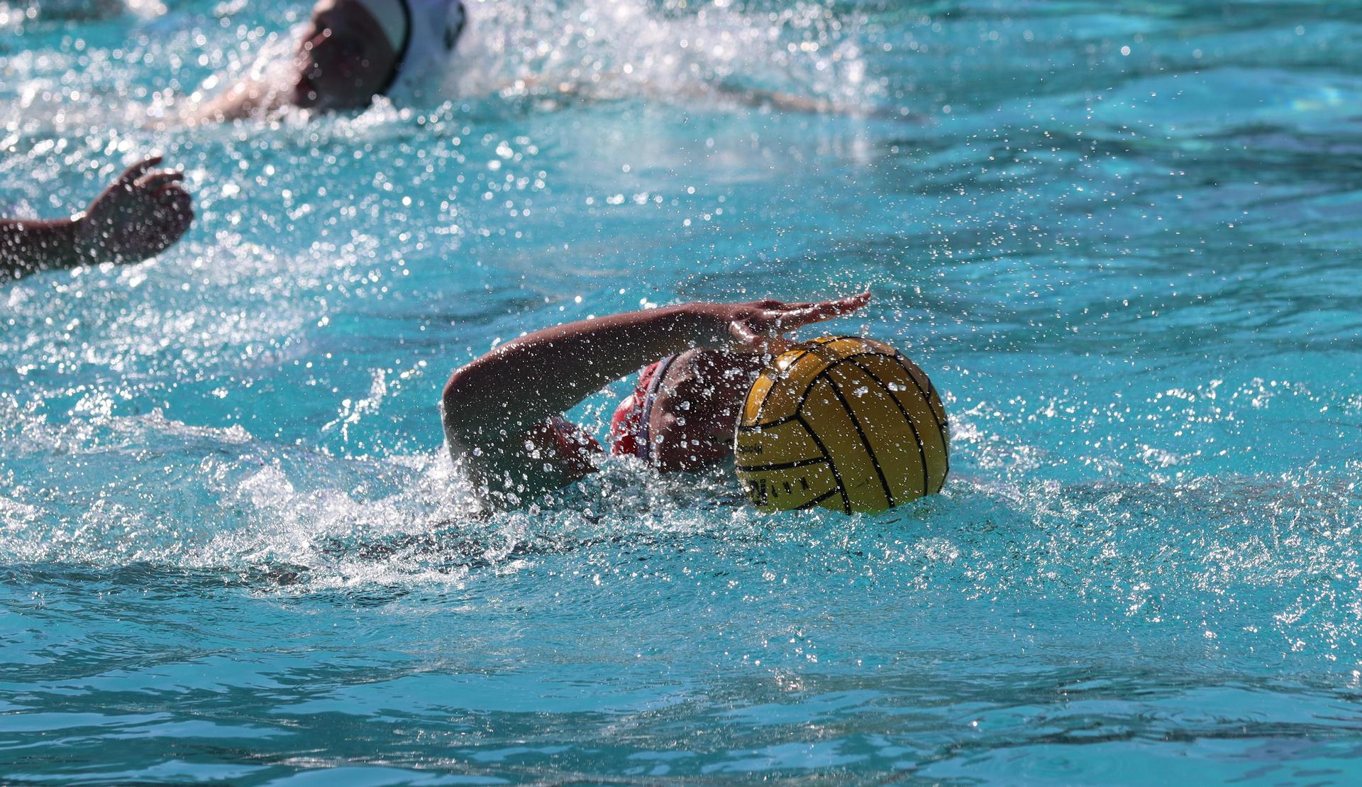 girls playing water polo against Hoover