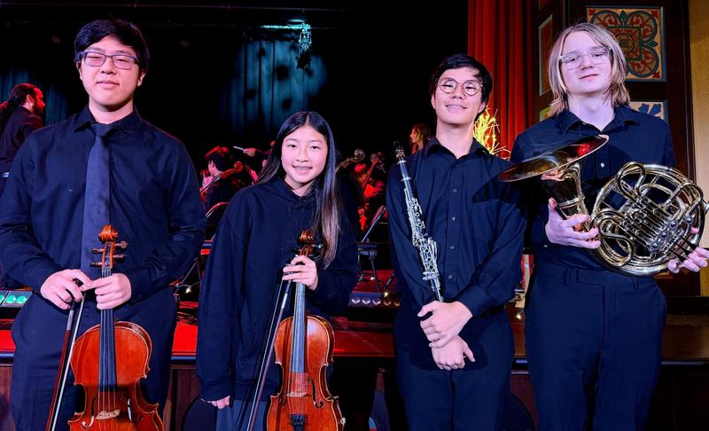 Pictured left to right: Aiden Lee, Abigail Keum, Justin Kim, and Wilson Jaroch prepare for their performances during the Winter Choir Concert. (Photo Courtesy of South Pasadena Unified School District)