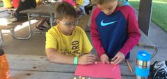 Camp Willard students working on a gumdrop structure project