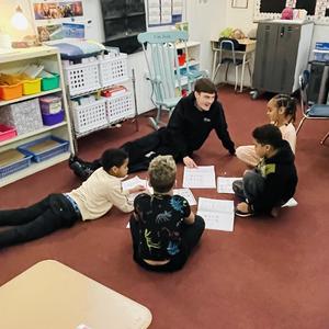 BHS Student sitting with Davis students