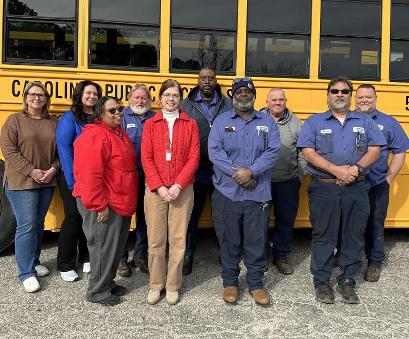 Picture of transportation department featuring bus drivers.