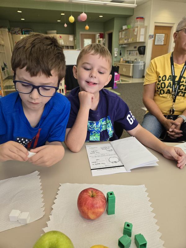 Students help find the prized apple